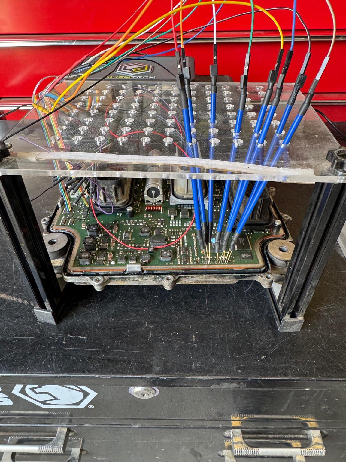 Diesel ECM connected to professional bench programming equipment